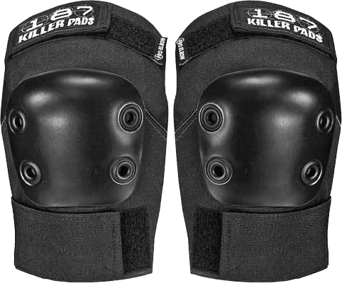 187 PRO ELBOW PADS XS-Black laid flat on concrete, showing low-profile cap and snug sleeve
