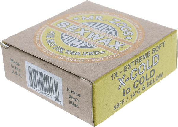 QUICK HUMPS 1X Yellow soft single bar surf wax on a surfboard deck