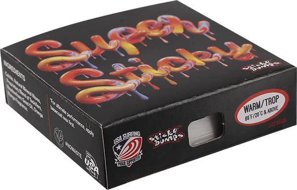 Single bar of SB Super Sticky Warm/Tropical Surf Wax on a board deck