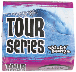 SB Tour Series Cool/Cold Single Bar surf wax bar with label sitting on a surfboard deck near the tail